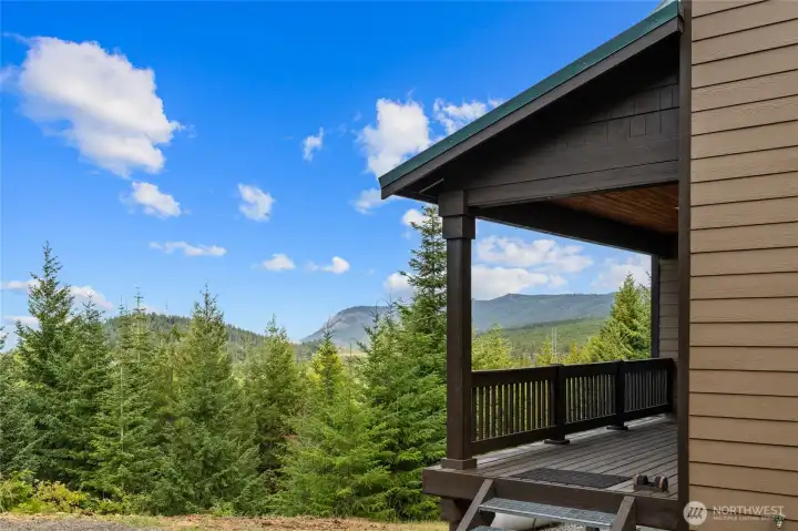 Unwind on this dreamy deck, where fresh mountain air, peaceful surroundings, and the sounds of nature await.