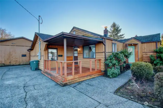 Perfect covered porch off the kitchen to enjoy your morning coffee and take in the views of the neighborhood.