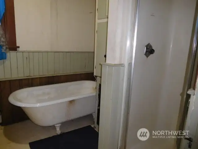 Full bath with separate shower stall