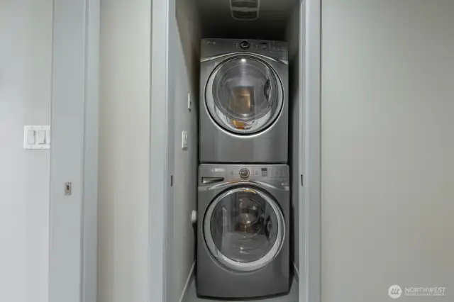 Washer/dryer within the primary bedroom.