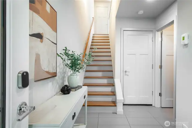 Step into this home through an inviting entryway with space for shoes and convenient storage.