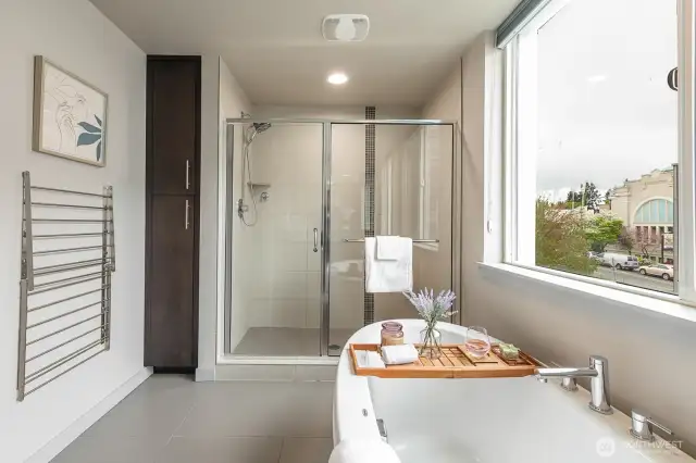 Ensuite bathroom also features large standing shower and extra storage.