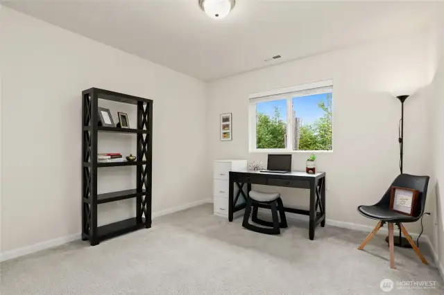 This room is staged as an office, but it is a bedroom with a full size closet.