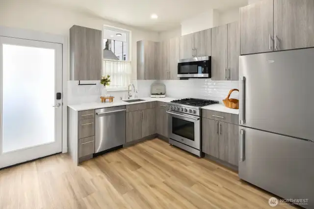 Kitchen w back door just steps from your designated parking space.