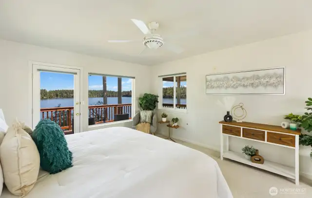Spacious primary Bedroom with lake views