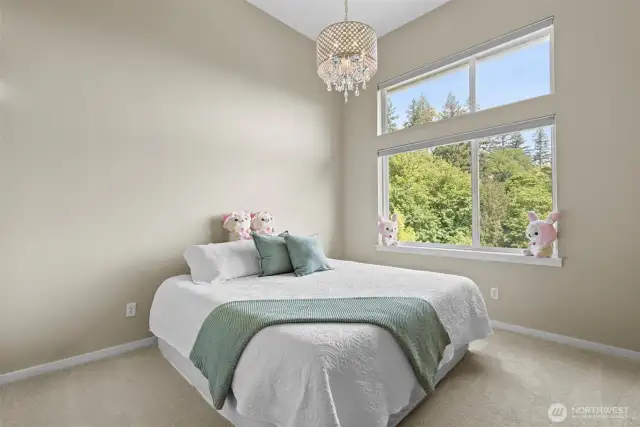 Primary bedroom with extra high ceilings & mountain views