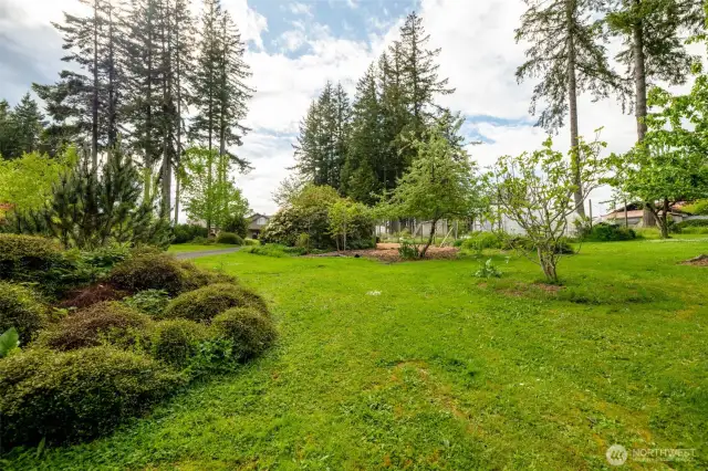 The private setting is nestled back from the road, this home is tucked away to maximize privacy while offering peaceful views that create a serene retreat.