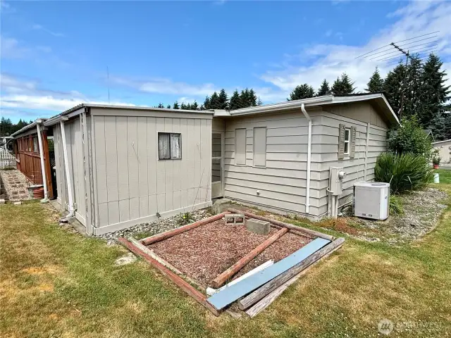 Back of the home with potential for a garden!