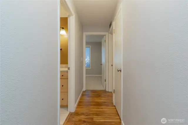 Hallway to front bedrooms & full bath on main floor