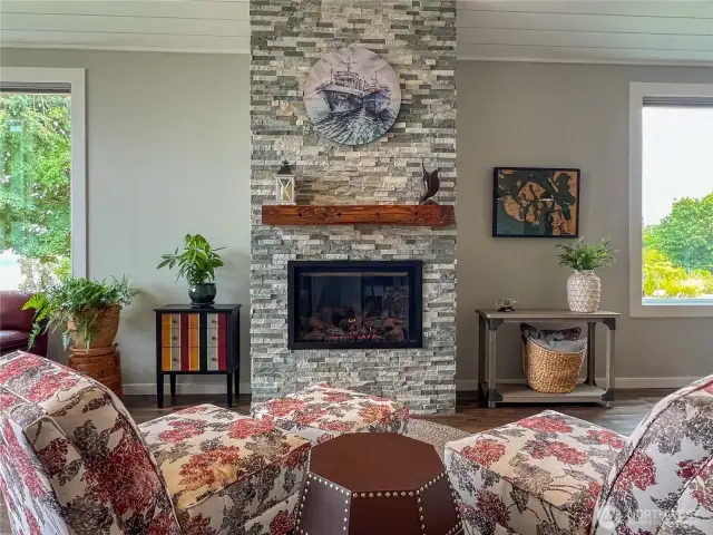 Propane insert and hearth is the center of the living room.