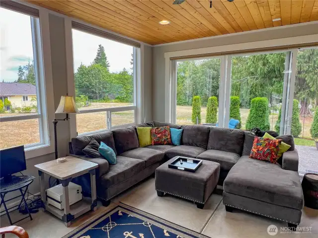 Inviting sunroom/den.