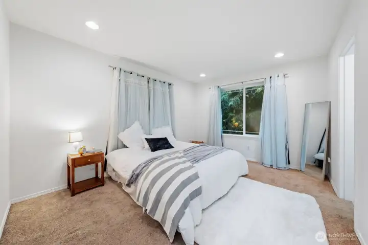 Large primary bedroom with large walk in closet and en suite