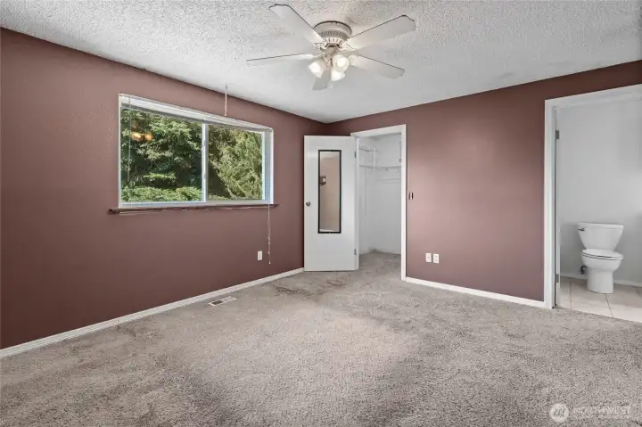 High window offers options for furniture placement.
