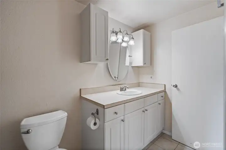 Bathroom offers two access points for convenience.