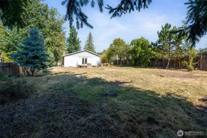 Build instant equity by adding a DADU on this large lot!