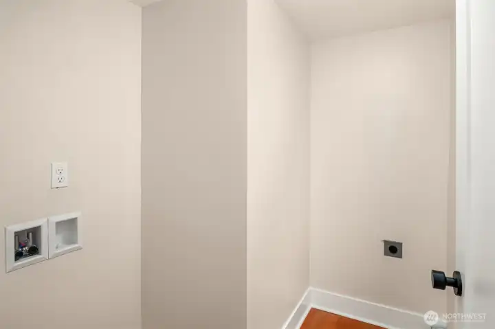 Utility room off of kitchen in dedicated area