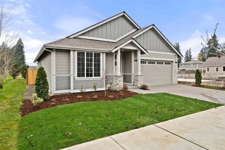 Great curb appeal and home sits on a lot with green space on one side and in the back!
