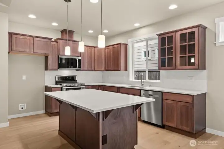 Sable-stained maple cabinets througout