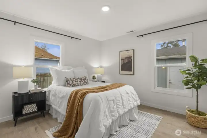 Second bedroom with backyard views