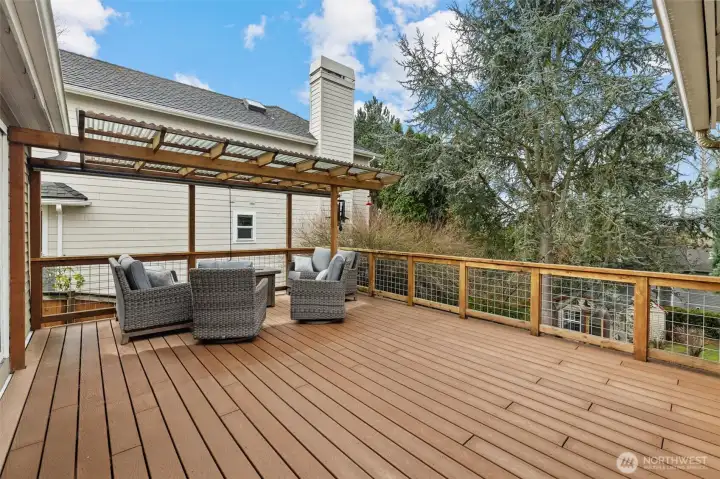 Connected entertaining deck off of the flex space and kitchen.