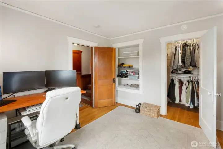 Bedroom on main level with walk-in closet.