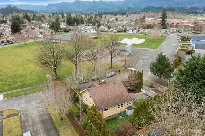 Drone shot of back side and park.