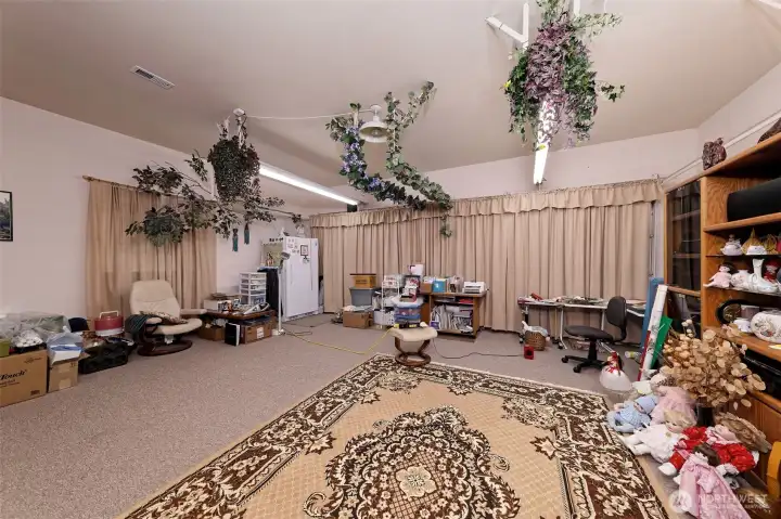 This is the 2 car garage. garage doors are behind the curtains.