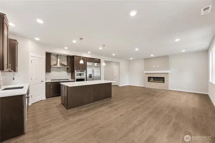 Another great view of the open concept great room. Actual home is under construction and materials, colors, and finishes will vary. See site agent for details.