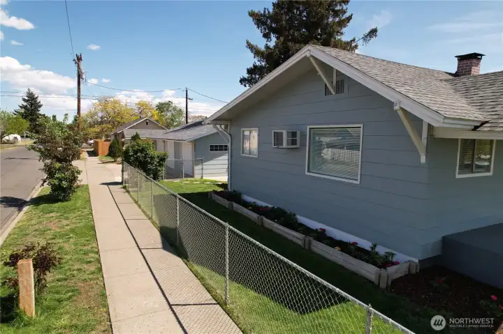 Side view. Fully fenced yard.