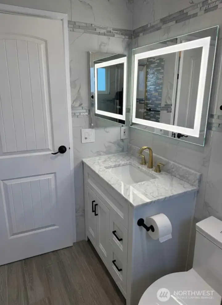 Automatic mirror light. You can adjust the brightness and/or disable it at night if you like.