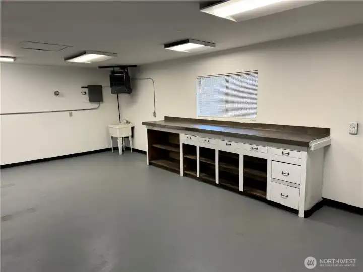 Second section of garage has two bays.