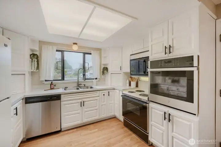 Plenty of cabinetry, newer wall oven, and lots of light!