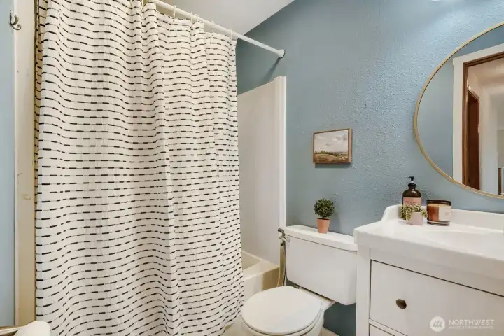 Full bathroom off the main level hallway.