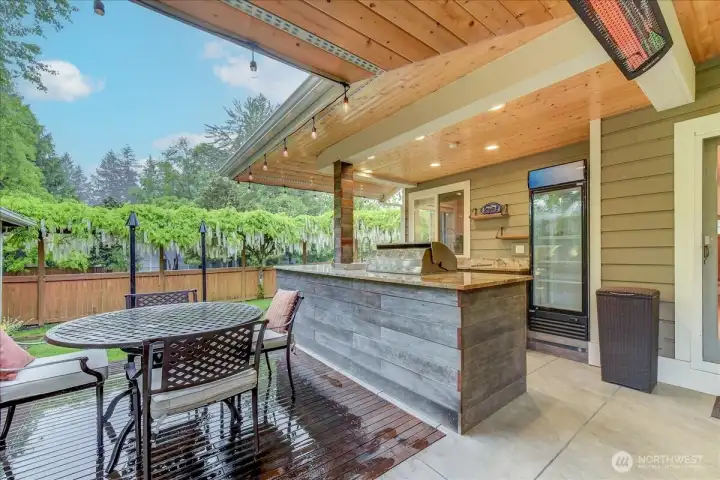 Custom-built with quality Ironwood construction, featuring professional-grade commercial heaters and elegant Kichler landscape lighting.