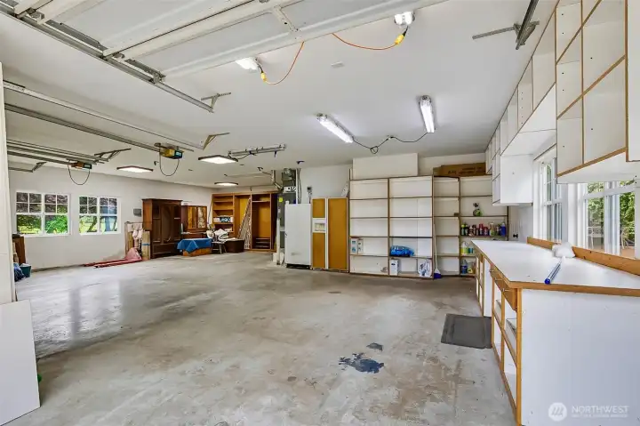 3 car garage with many built-ins,