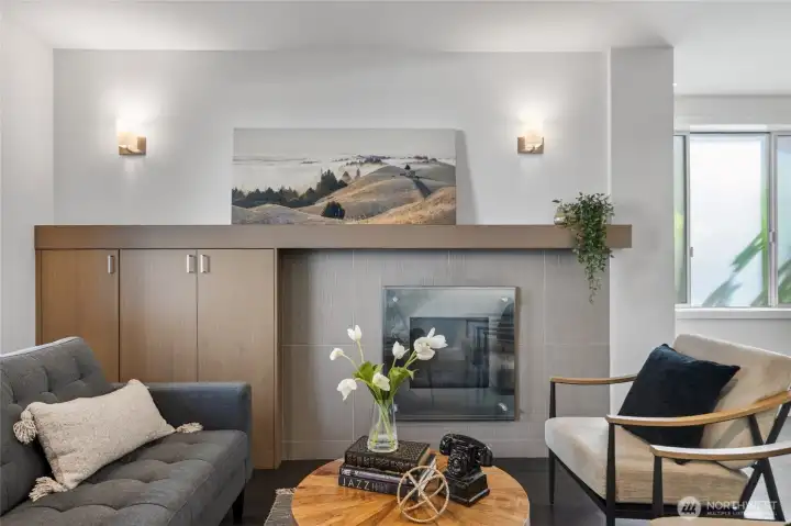 Living area with gas fireplace and built-in storage
