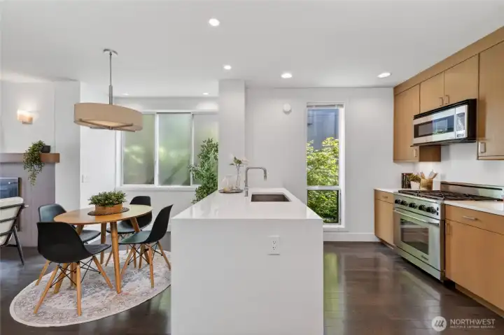 Kitchen with waterfall quartz counters