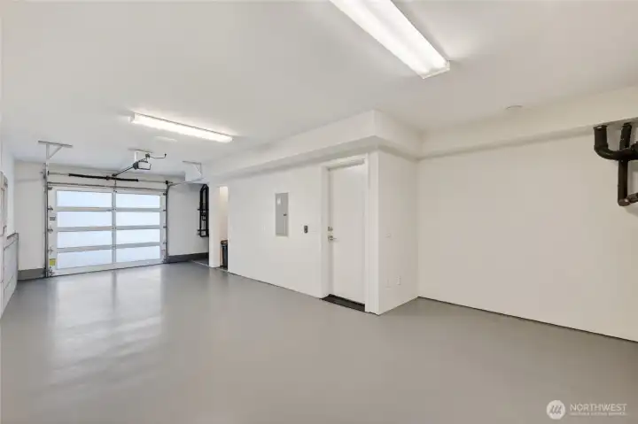 Clean, tandem garage with storage