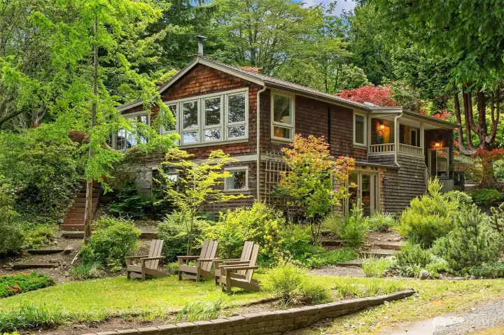 Nestled into the 1.8 acres, this 1,720 square foot craftsman is beautifully centered among the terraced gardens. Nestled into the 1.8 acres, this 1,720 square foot craftsman is beautifully centered among the terraced gardens.