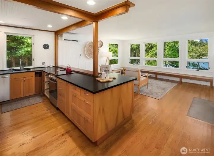 The truly open-concept main level features timeless wood finishes - and views for miles. The truly open-concept main level features timeless wood finishes - and views for miles.