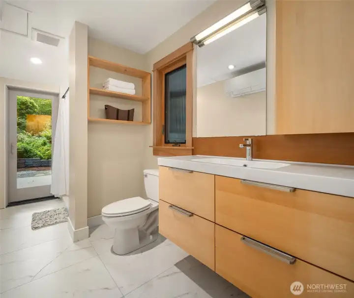 The completely renovated bathroom on the main level. The completely renovated bathroom on the main level.