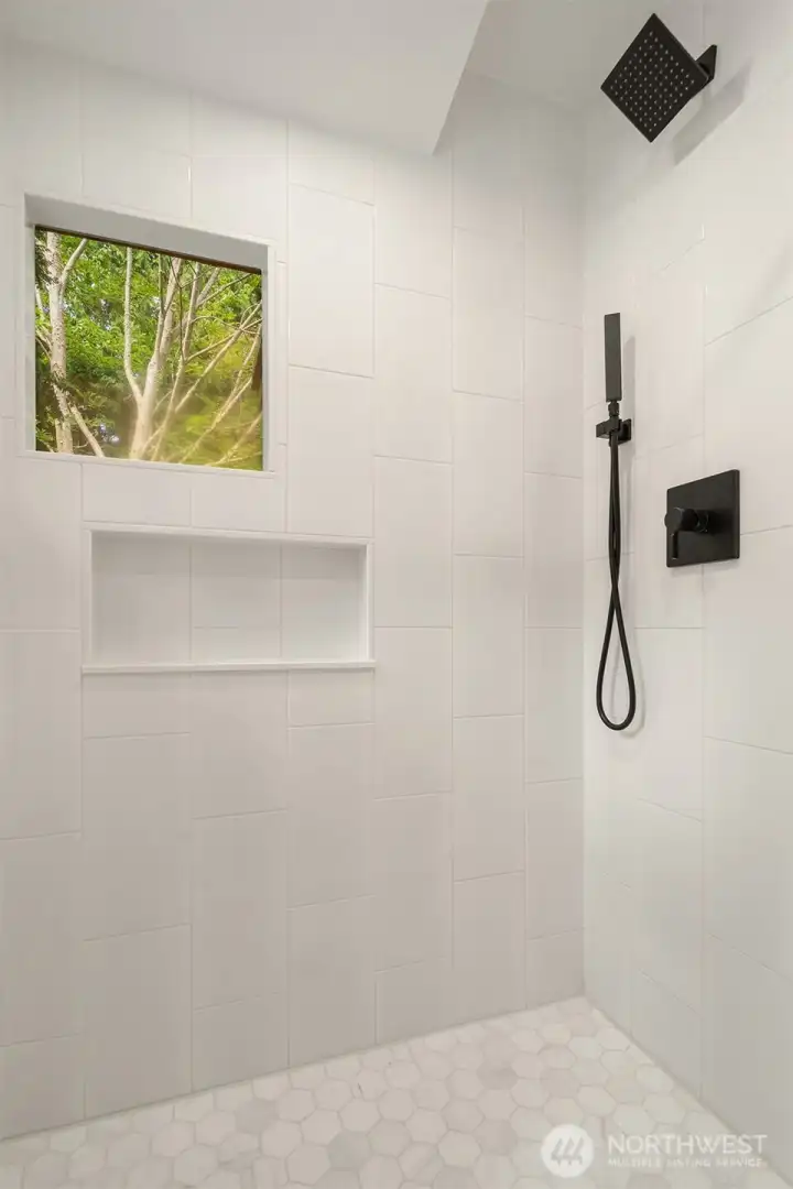 Beautiful and stylish tiled walk-in shower. Beautiful and stylish tiled walk-in shower.