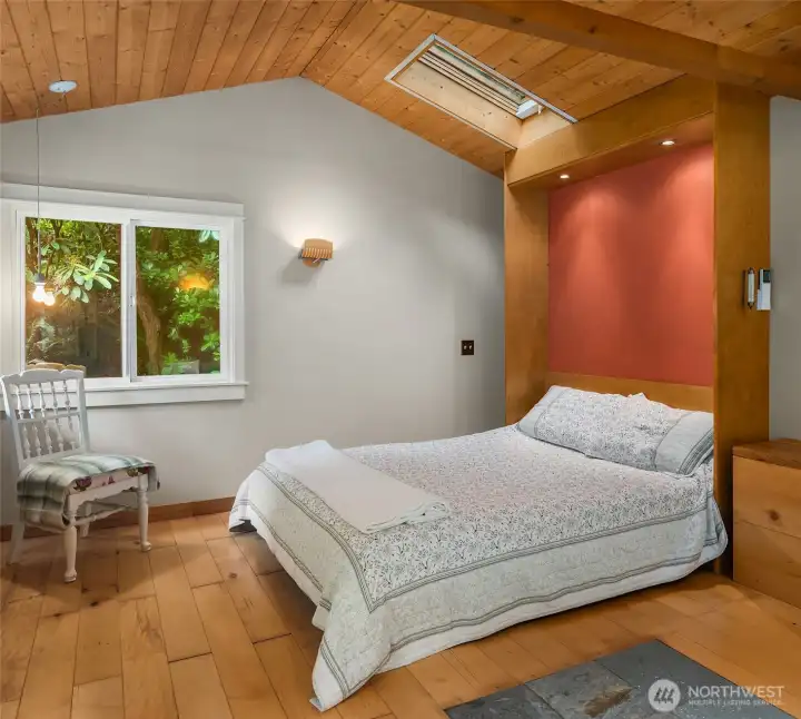 A murphy bed in the guest studio makes for the ideal spot to enjoy a quiet night's sleep. Or, push the bed up and you have a private yogo studio. A murphy bed in the guest studio makes for the ideal spot to enjoy a quiet night's sleep. Or, push the bed up and you have a private yogo studio.