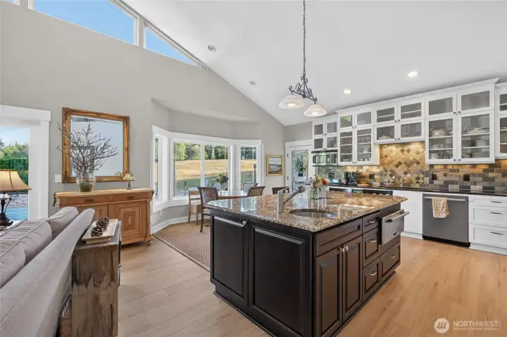 Well-proportioned island with warming oven and sink.