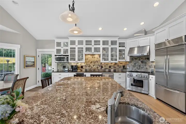High end appliances and beautifully crafted cabinets are just a few of these stunning kitchen's features.