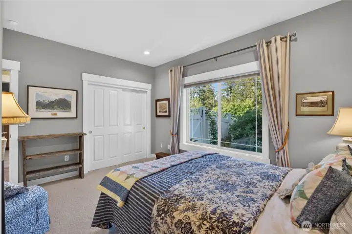 Generous second bedroom with an adjoining Jack-and-Jill-style bathroom.