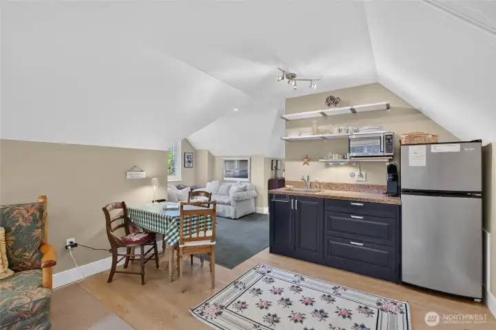 Cute kitchette and a 3/4 bath above the gargage are suited for work, play or guests you decide.