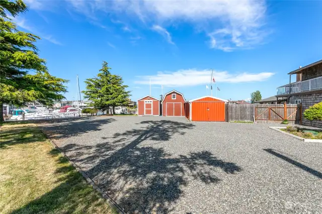 The second lot has a parking shed, workshop and shed for additional storage. The L-shaped dock on this lot measures 100 ft x 50 ft.