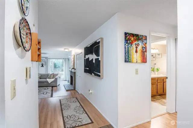 Inside entry to condo. You have coat closet directly to your right and kitchen to your left.