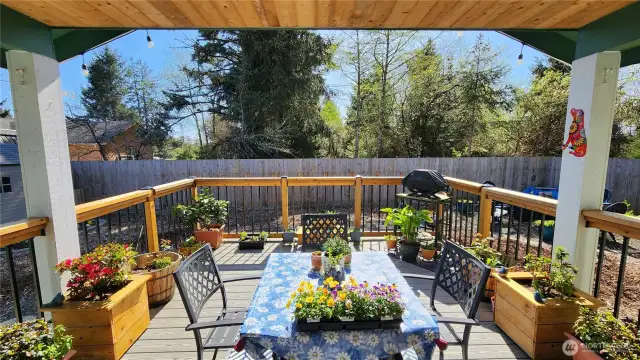 Private, large, covered backyard deck. Great for entertaining or just enjoying the sounds of nature.